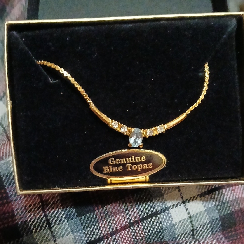 Gold Necklace with Blue Topaz Accent